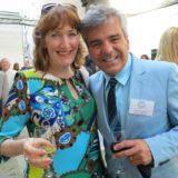 Artist Susan Pepler and entertainment host Mose Persico at Share the Warmth Fundraiser